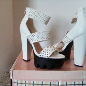 Size 7 1\2 Wild Diva Lounge white ankle strap platforms with zip heel.